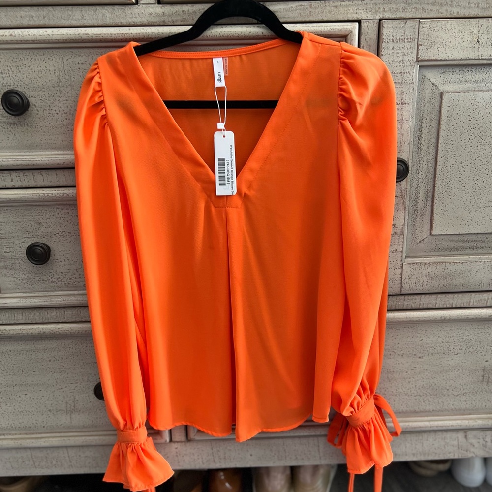 Glam, beautiful blouse with ruffle tie sleeves. NWT Small